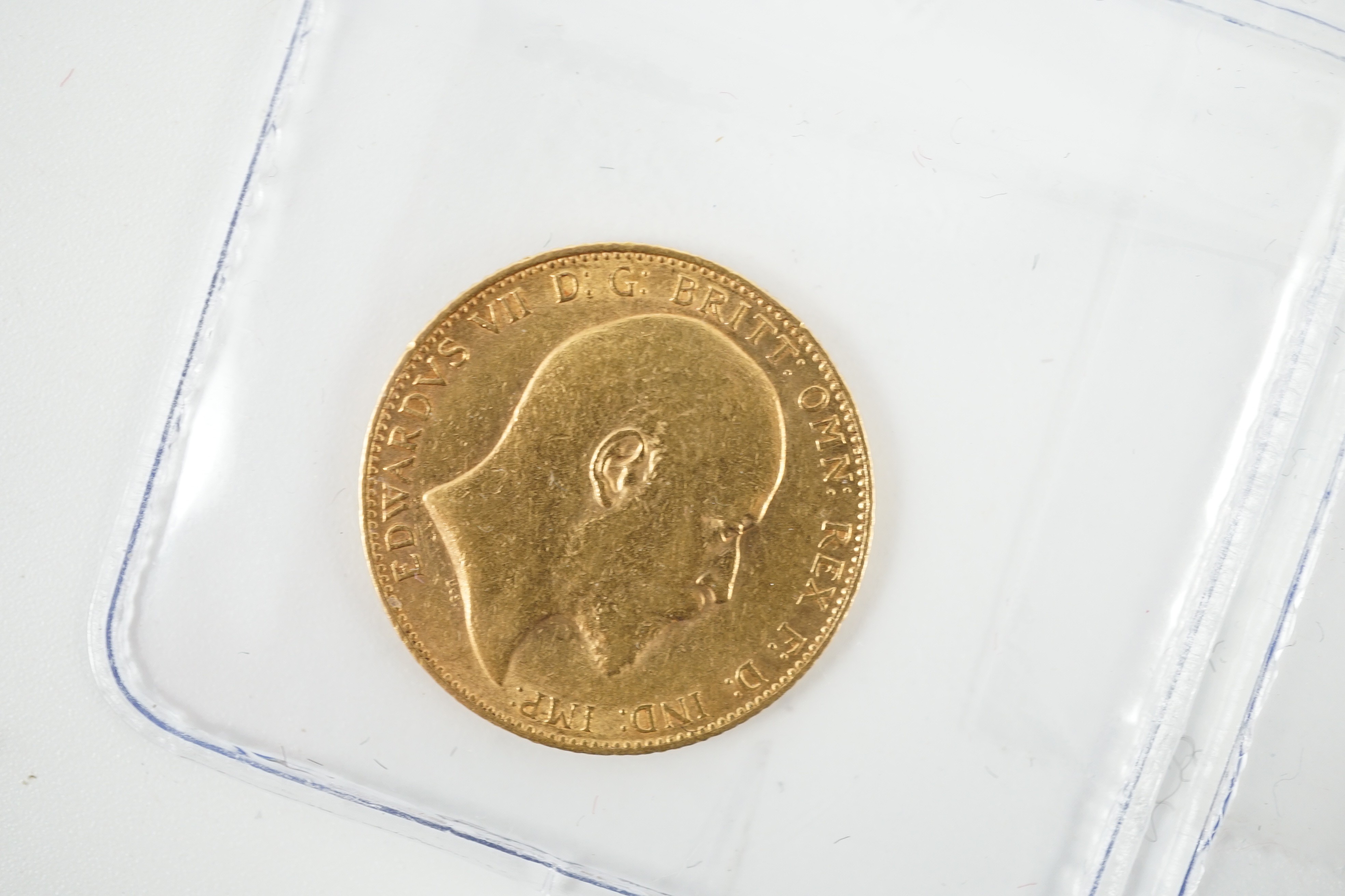 Two gold sovereigns, Victoria 1898M and Edward VII 1910, a George V half sovereign 1913 and a France gold 10 francs 1900 (test mark to portrait).